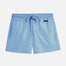 "Front view of Charlie blue kids swim shorts featuring an adjustable drawstring and Moeva patch."