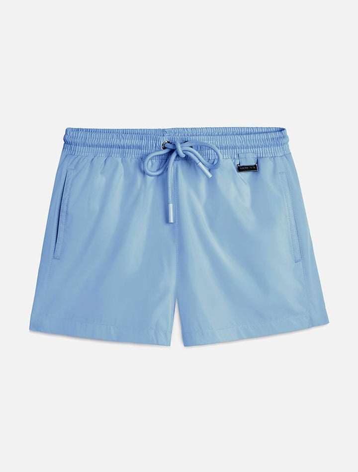 Front View: Charlie Blue Kids Shorts - Close Fitting, Lightweight Fabric, Pockets at the Front, Elasticated Waistband, Drawstring, Quick Dry, MOEVA Luxury Swimwear 
