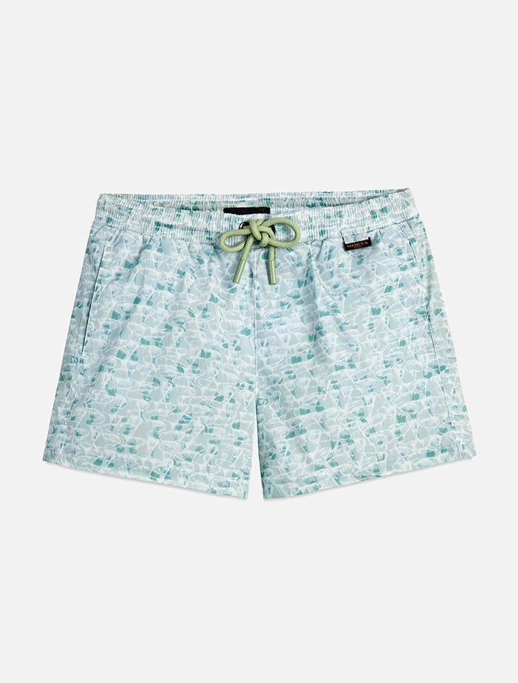 "Front view of Charlie green abstract kids swim shorts, featuring an adjustable drawstring, Moeva patch, and side pockets."