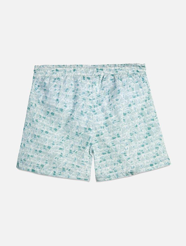 "Back view of Charlie green abstract kids swim shorts, showcasing the design and functionality of the waistband and fabric."