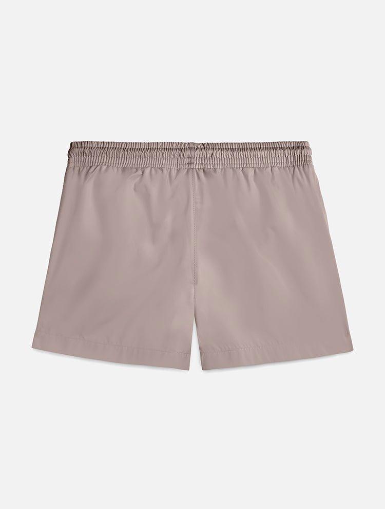 "Back view of the Charlie Khaki Kids Swim Shorts, displaying the comfortable fit and the minimalist design."