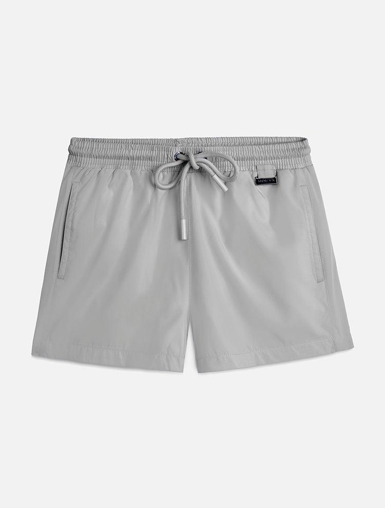 "Front view of the Charlie Light Grey Kids Swim Shorts, displaying the comfortable fit and the minimalist design."