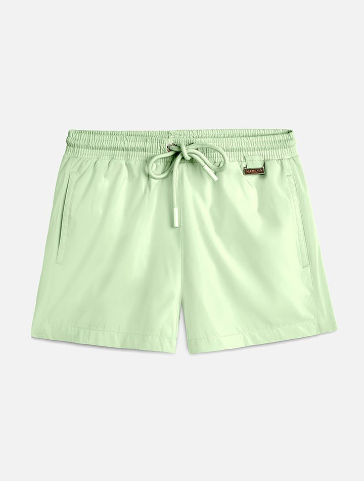 Front View: Charlie Mint Green Kids Shorts - Close Fitting, Lightweight Fabric, Pockets at the Front, Elasticated Waistband, Drawstring, Quick Dry, MOEVA Luxury Swimwear 