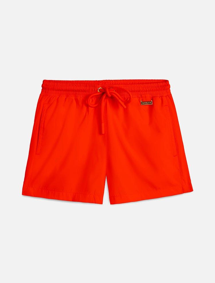 "Front view of the Charlie Orange Kids Swim Shorts, showcasing the elastic waistband with adjustable drawstring and the Moeva patch."