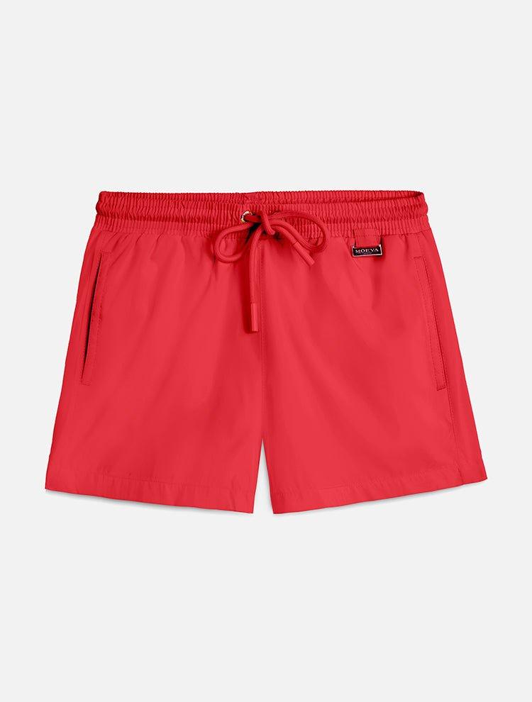 "Front view of Charlie Red Kids Swim Shorts, showcasing the elastic waistband with adjustable drawstring and the Moeva patch."