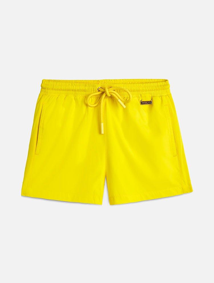 "Front view of the Charlie Yellow Kids Swim Shorts, showcasing the elastic waistband with adjustable drawstring and the Moeva patch."