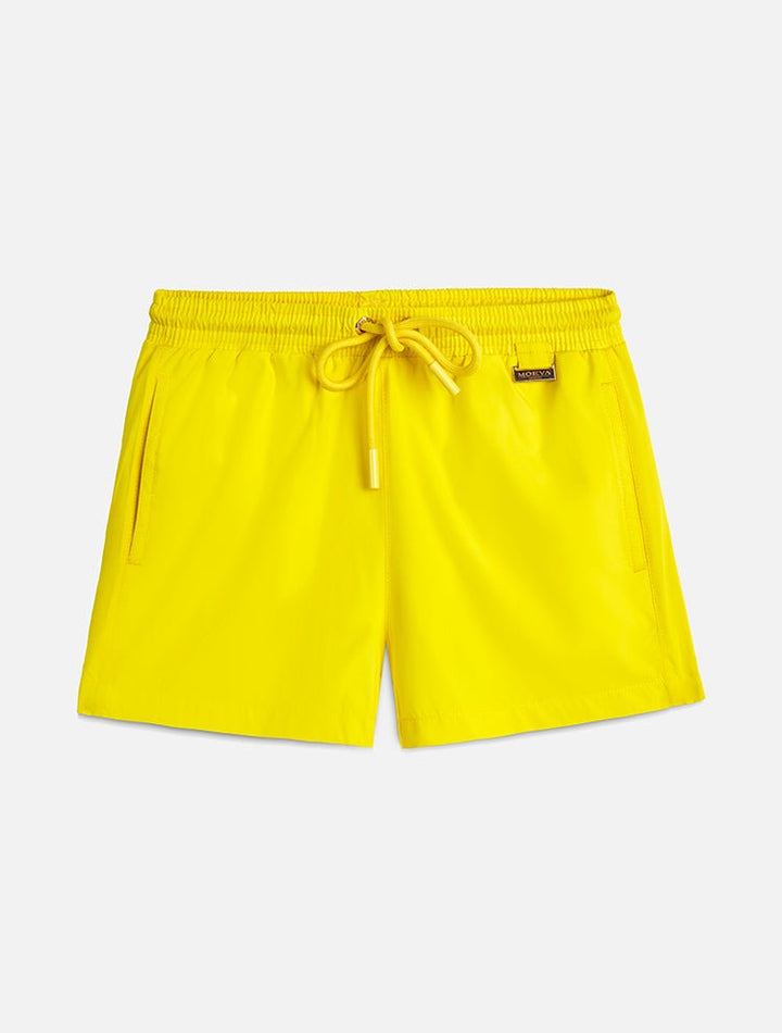 Front View: Charlie Yellow Kids Shorts - Close Fitting, Lightweight Fabric, Pockets at the Front, Elasticated Waistband, Drawstring, Quick Dry, MOEVA Luxury Swimwear 