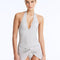 Front View: Model Wearing Clementine Silver Swimsuit - V-Neck, Metallic Fabric, Full Bottom Coverage, Removable Padding, MOEVA Luxury Swimwear