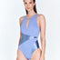 "Model wearing the Cleo Swimsuit from the front, highlighting the high neckline with oval plunge, matte satin fabric, and elegant design."