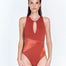 ""Cleo Red Ochre Swimsuit featuring a high neckline with a sexy oval plunge and matte satin fabric. Designed for an elegant look."