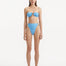 Front view of Clyde Baby Blue Bikini Bottom, showcasing high-waist design and gold accessories.