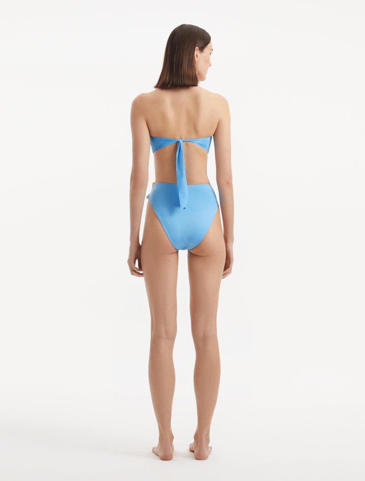 Back view of Clyde Baby Blue Bikini Bottom, highlighting sleek fit and luxurious fabric.