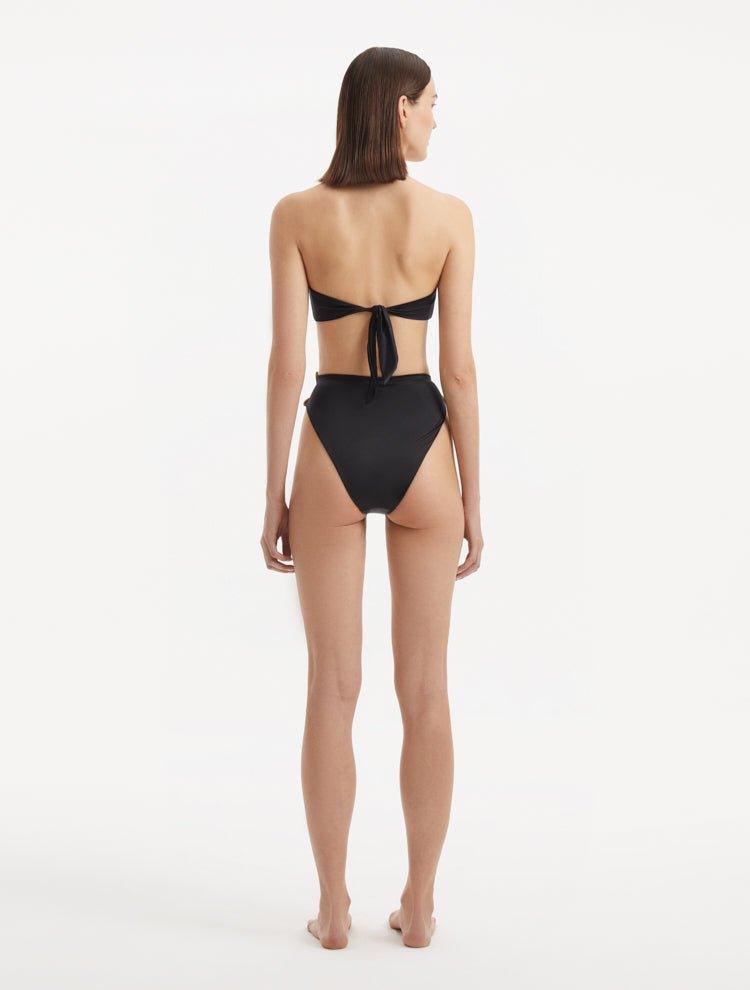 Back view of Clyde Black Bikini Bottom, showcasing sleek fit and elegant lines.