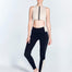 "Colombe Black/Nude leggings front view showing high-waist design with contrast panels. "