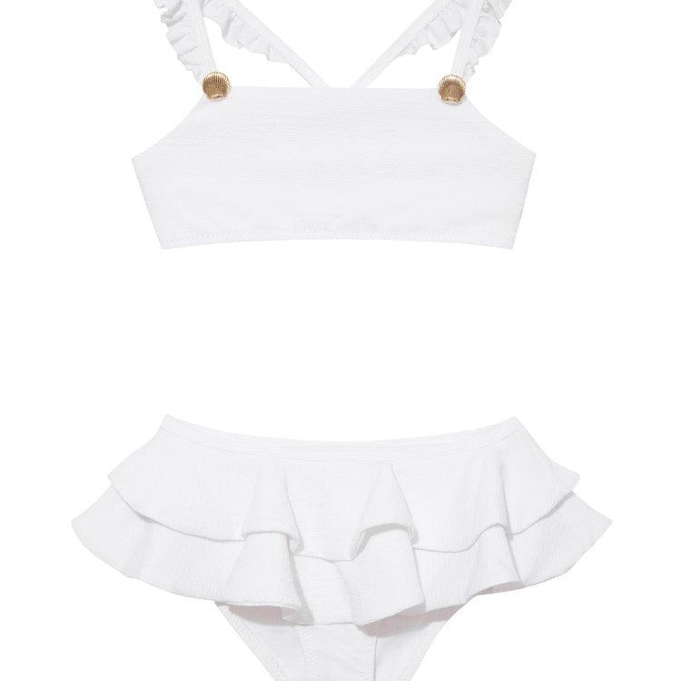 Dassy White Ruffle Strap Kids Bikini Set with Layered Skirt | Moeva | Bikini Set | Each week unveils new pieces—luxury swimwear, fluid resort silhouettes, and elevated summer-to-evening essentials designed to carry you from coastal escapes to city nights.