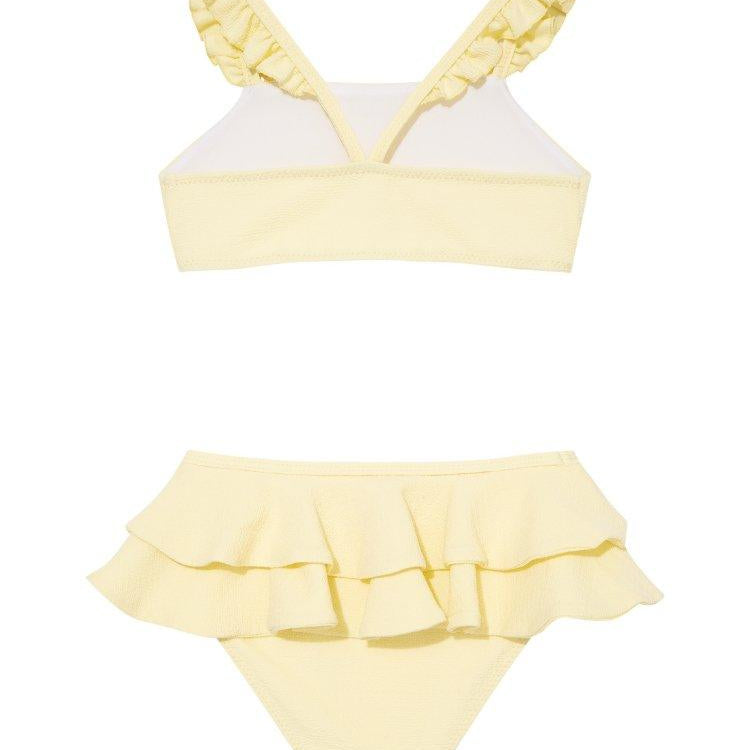 Dassy Yellow Ruffle Strap Kids Bikini Set with Layered Skirt | Moeva | Bikini Set | Each week unveils new pieces—luxury swimwear, fluid resort silhouettes, and elevated summer-to-evening essentials designed to carry you from coastal escapes to city nights.