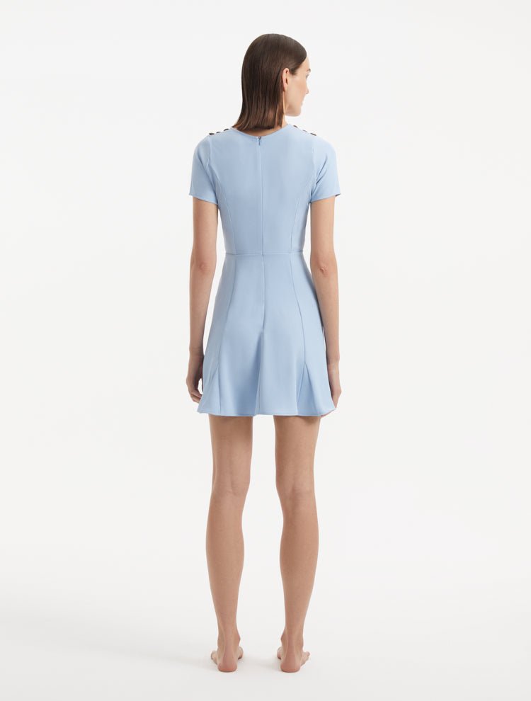 "Back view of the Derin Baby Blue Dress, emphasizing the back zip and clean lines of the dress."