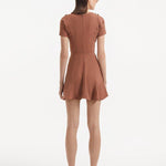 "Back view of the Derin Brown Dress, emphasizing the back zip and clean lines of the design."