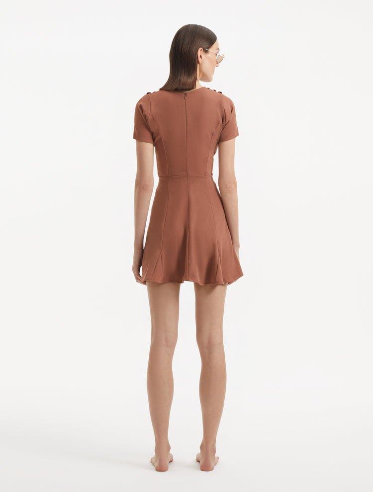 "Back view of the Derin Brown Dress, emphasizing the back zip and clean lines of the design."