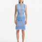 "Model wearing the Diani Baby Blue Dress from the front, highlighting the mesh knit fabric and knee-length design."