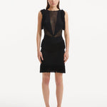 "Model showcasing the Diani Black Dress from the front, featuring a knee-length design and elegant mesh knit fabric."