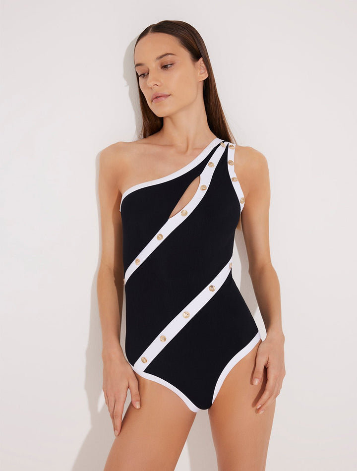 Front View: Model in Dido Black/White Swimsuit - MOEVA Luxury Swimwear, Full Bottom Coverage, Fully Lined, Removable Padding, Italian Fabric, Special Lycra Xtralife Certificate, MOEVA Luxury Swimwear 