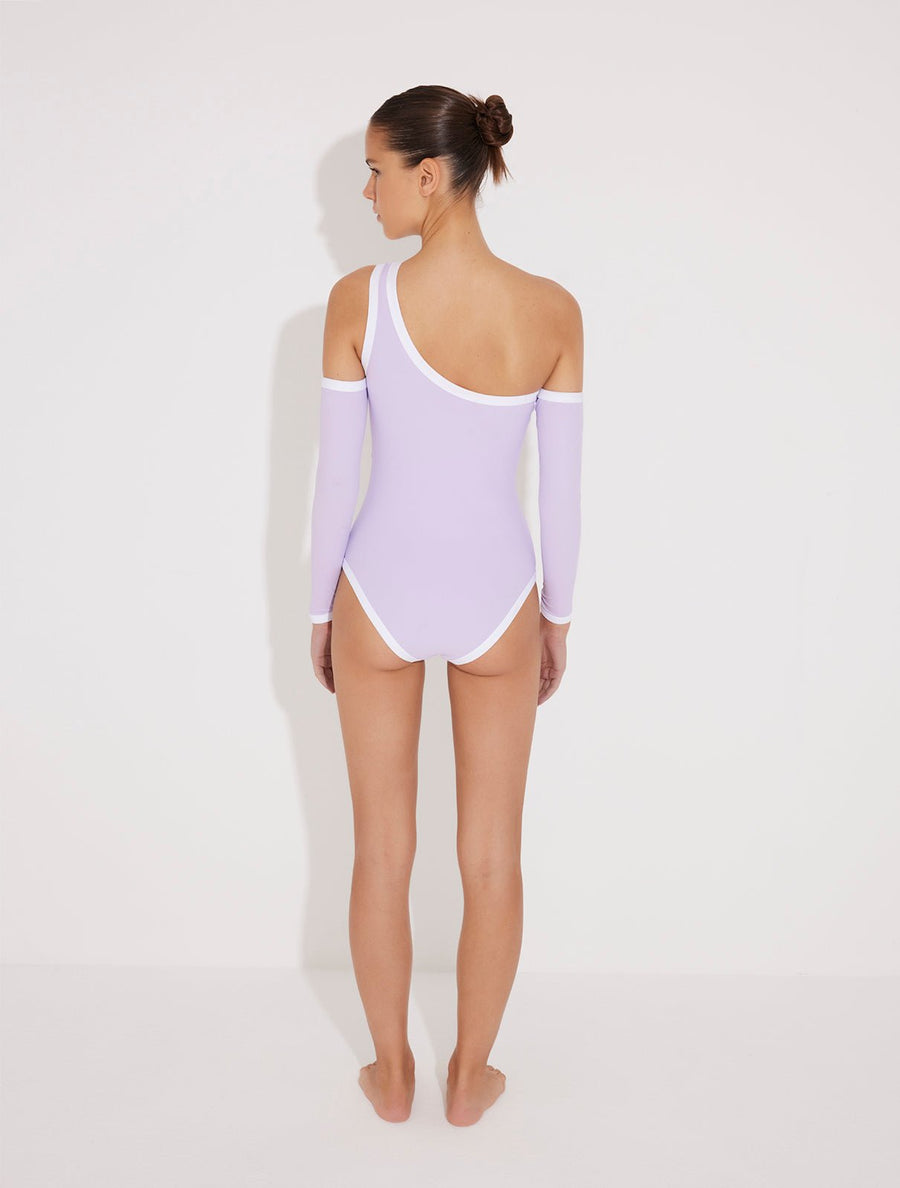 Back View: Model in Dido Lilac/White Swimsuit  - One Shoulder, Removable Sleeves, Slash Cutout, Duo Colored, Gold Button Detailing, One Piece Swimsuit, MOEVA Luxury Swimwear 
