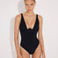 Front View: Model in Diletta Black Swimsuit - MOEVA Luxury Swimwear, Monowired, V-Neckline, Slimming Effect Stitching Details, Embroidered Top, Moderate Bottom Coverage, Removable Paddings, MOEVA Luxury Swimwear 