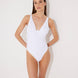 Front View: Model in Diletta White Swimsuit - MOEVA Luxury Swimwear, Monowired, V-Neckline, Slimming Effect Stitching Details, Embroidered Top, Moderate Bottom Coverage, Removable Paddings, MOEVA Luxury Swimwear 