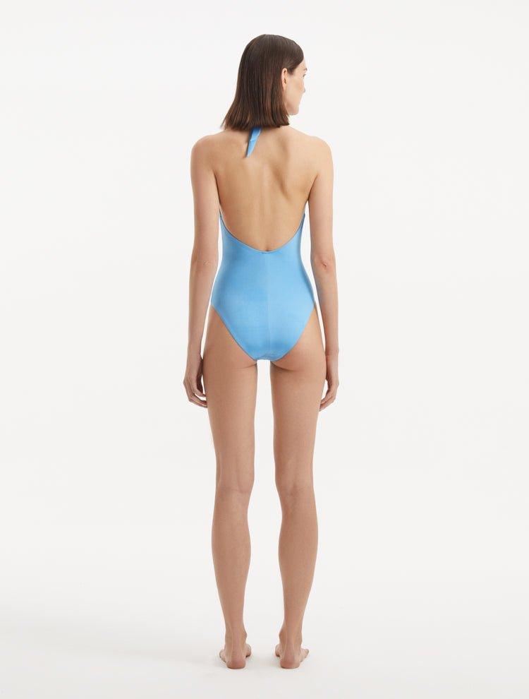 Back view of the Dwyn Baby Blue Swimsuit, showcasing the high waist and moderate bottom coverage.