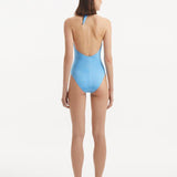 Back view of the Dwyn Baby Blue Swimsuit, showcasing the high waist and moderate bottom coverage.