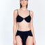 "Front view of the Dylan Bikini Bottom, showcasing the high-rise waist, adjustable tie-front detail, and high-leg cut."