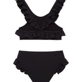 "Back view of the Effy black kids bikini set, highlighting the secure fit of the full-coverage bottoms and classic design."