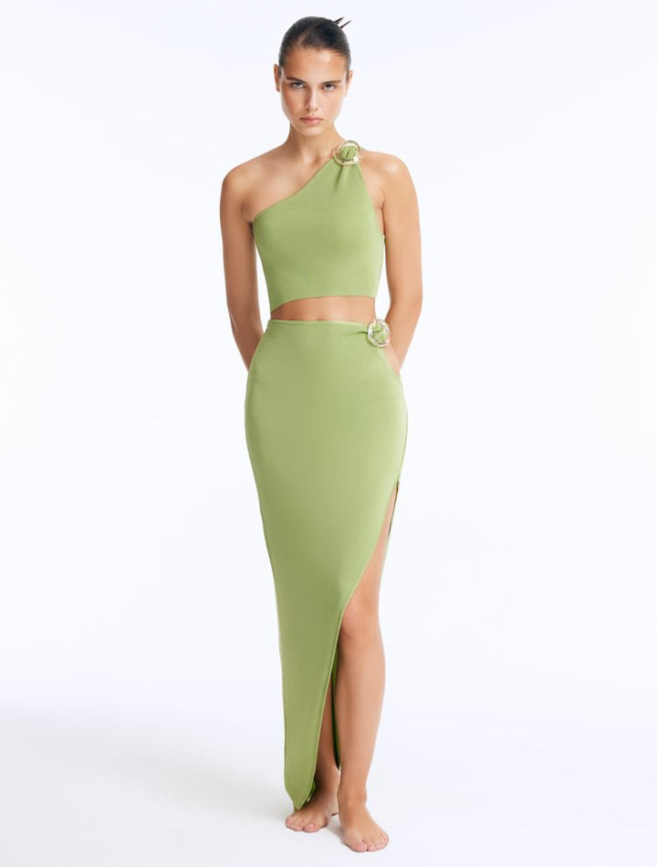 Front View: Model in Eila Green Top - One Shoulder Silhouette, %100 Viscose, Knitted Crop Top, Close Fit, MOEVA Luxury Swimwear