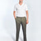 Front View: Model in Enzo Army Green Pants - MOEVA Luxury Swimwear, Straight-Leg Cut, Pleats at Front, Slip Pocket, Welt Pockets, Mid-Rise, Ankle Length, MOEVA Luxury Swimwear