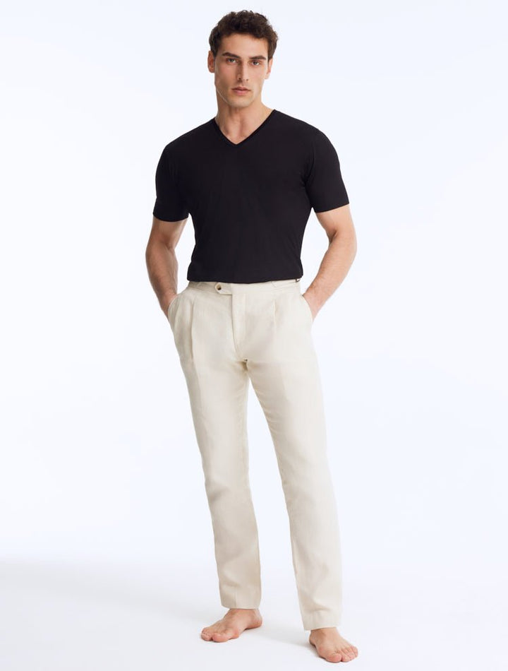 Front View: Enzo Grey Pants on Model - MOEVA Luxury Swimwear, Straight-Leg Cut, Pleats at Front, Slip Pocket, MOEVA Luxury Swimwear  
