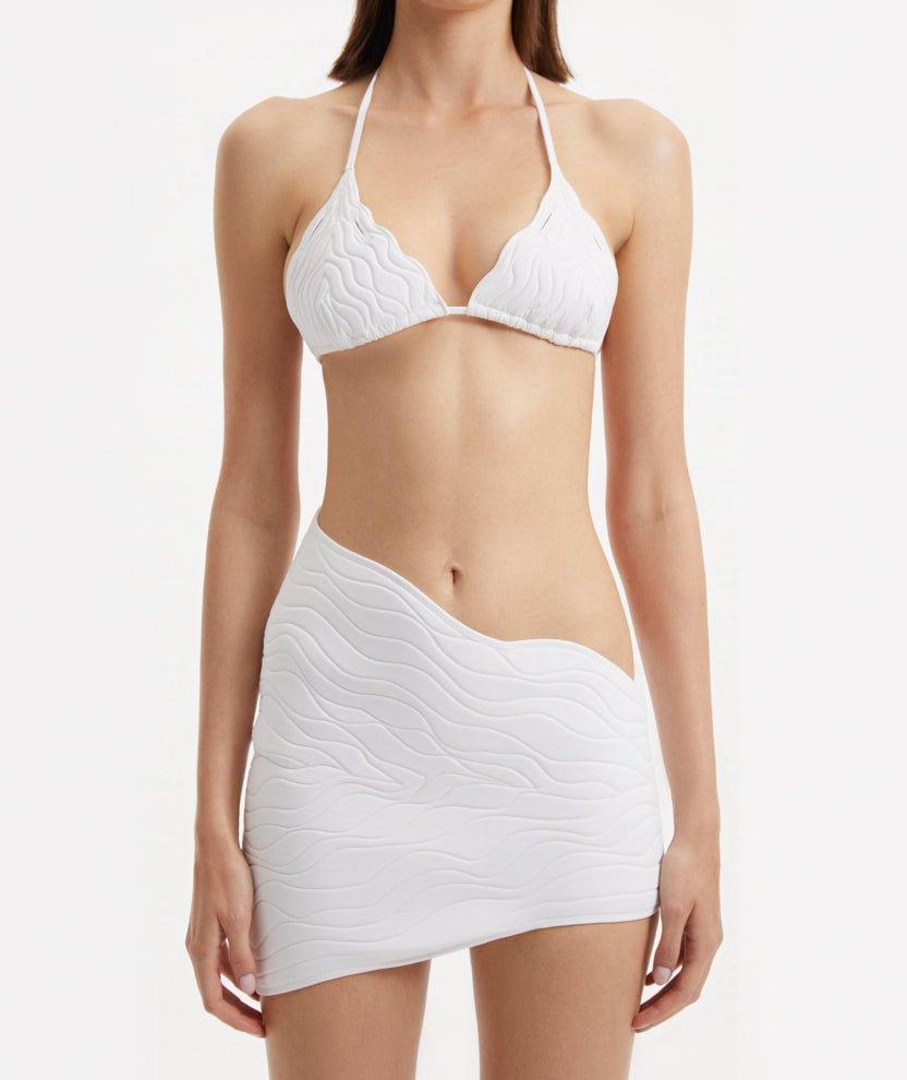 Ephram White Wave-Textured Mini Skirt Skirt | Moeva | Beachwear Skirts | Each week unveils new pieces—luxury swimwear, fluid resort silhouettes, and elevated summer-to-evening essentials designed to carry you from coastal escapes to city nights.