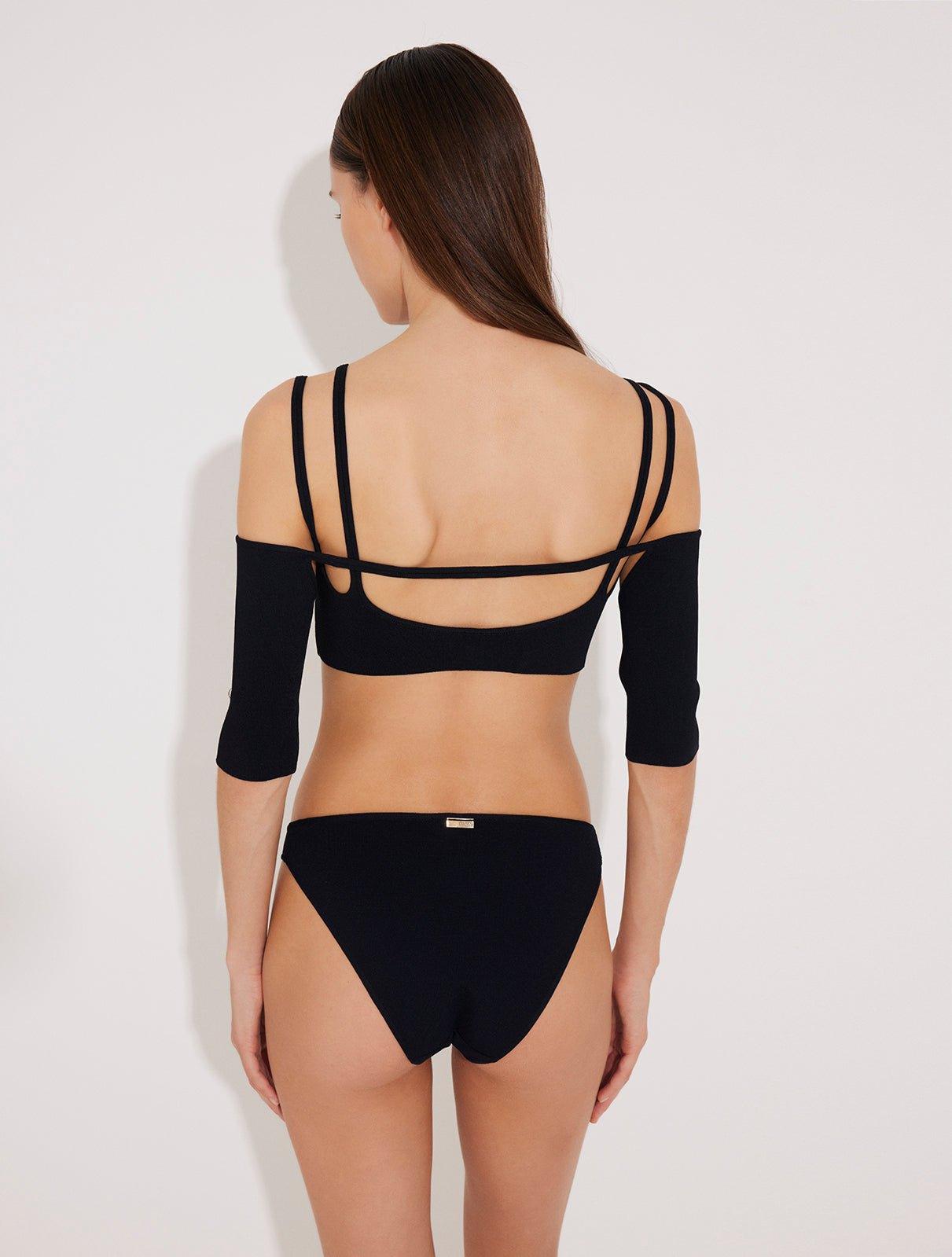 Back View: Model in Erie Black Bikini Top - MOEVA Luxury Swimwear, Removable Sleeves, Complete the Look with Ontario Skirt, MOEVA Luxury Swimwear   