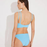  "Model showcasing the Erie Blue Low Waist Knitted Bikini Bottom from the back, emphasizing the knitted texture a"nd flattering fit.