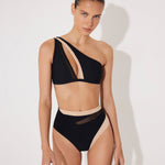 Front View: Model in Etta Black/Nude Bikini Bottom - MOEVA Luxury Swimwear, Geometrical Design, Mesh Details, High-Waist, Duo Colored, MOEVA Luxury Swimwear  