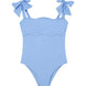 Model wearing the Everlee Baby Blue Swimsuit, showcasing the self-tie straps and ruffle details.