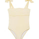Model wearing the Everlee Yellow Swimsuit, showcasing the self-tie straps and ruffle details.