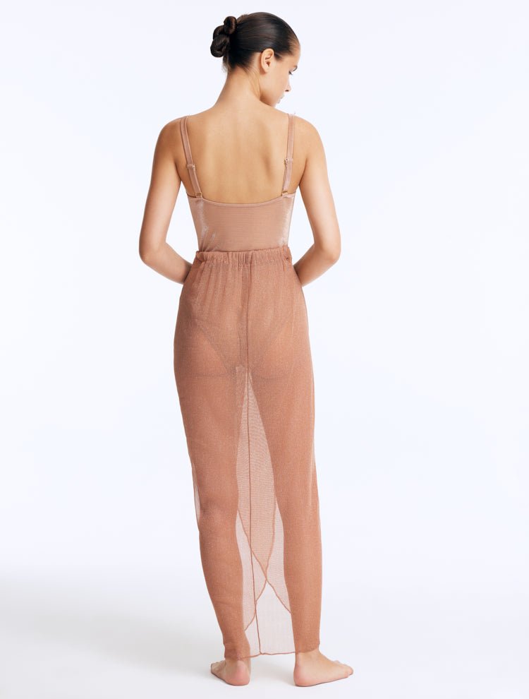 Back View: Fern Bronze Skirt on Model - Wrap Style with Twist Knot Detail, Draped Details, Elastic Band at the Waist, Loose Fit, MOEVA Luxury Beachwear