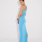 "Back view of the Fewa Blue One-Shoulder Knitted Dress revealing the elegant cut and high-shine viscose material, perfect for formal occasions and summer festivities."