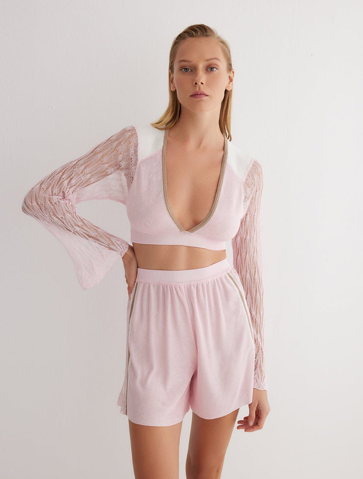 Front View: Model in Freja Pink/White/Nude Shorts - MOEVA Luxury Swimwear, Knitted Shorts, Semi-Sheer Panels, High Waisted, Loose Fit, Mid-Thigh Length, Elasticated Waistband, MOEVA Luxury Swimwear