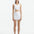 Front View: Model in Garda White Top - MOEVA Luxury Swimwear, High Neck, Bands At The Waist, Cut-outs At Side Seam, Open Back, Ready to Wear Top, MOEVA Luxury Swimwear