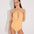 Front View: Model in Giovanna Orange Swimsuit - MOEVA Luxury Swimwear, Plunging Halter Neck, Tie Neck, Twist-Front Detail, Gold Sculpted Hoop Accessory, Removable Padding Black Swimsuit,  MOEVA Luxury Swimwear 