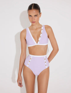 "Front view of Greca lilac/white high-waisted bikini bottom featuring stylish gold buttons."