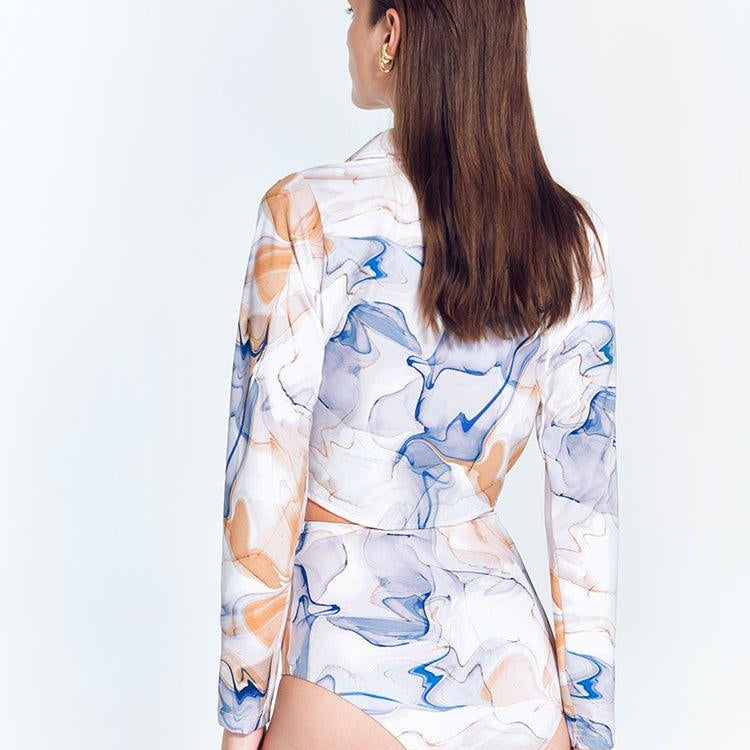 Greta Blue Abstract Long Sleeve Tie Front Shirt | Moeva | Shirt | Each week unveils new pieces—luxury swimwear, fluid resort silhouettes, and elevated summer-to-evening essentials designed to carry you from coastal escapes to city nights.
