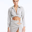 Front View: Model wearing Greta Silver Shirt - Cropped Silhouette, Tie at the Front, Metallic Fabric, Comfortable Beachwear Shirt, MOEVA Luxury Beachwear